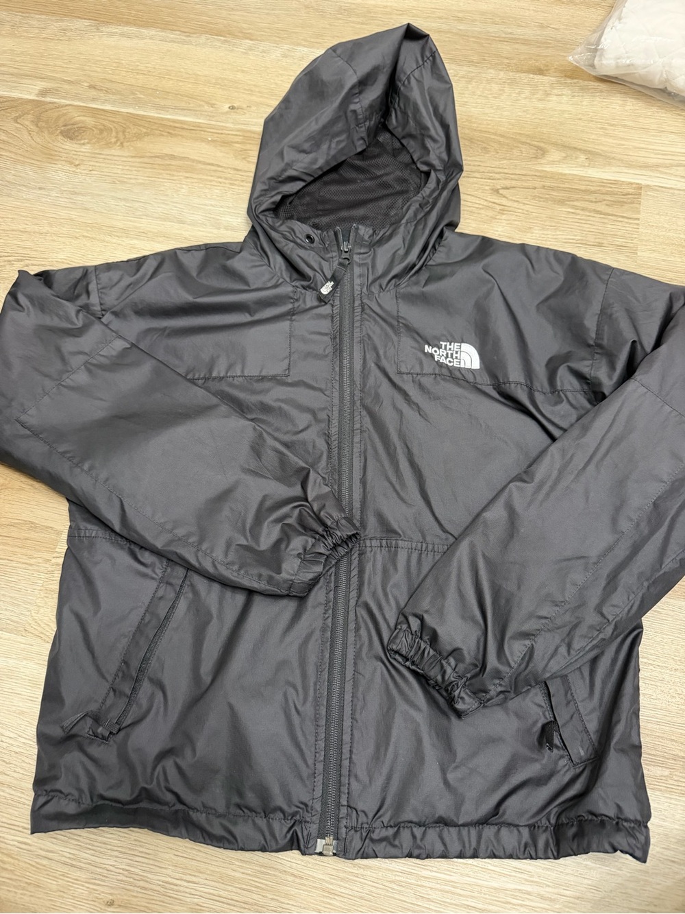 The North Face women’s Hooded Windbreaker Jacket - Black
